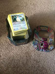 341 Pokémon cards plus collector tin
