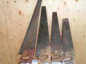 FOUR OLD HANDSAWS