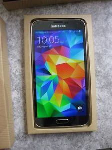 Gold Samsung Galaxy s5 (Unlocked in Mint condition w/Box)