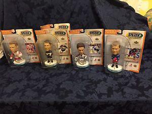 NHL bobble heads and UFC figures new in packages