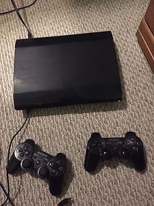 500 gb PS3 with 2 controllers and 9 games