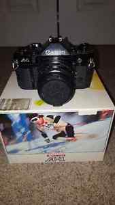 Canon A-1 35mm SLR camera 3 Lens and Accessories