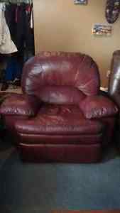 Maroon Ashley leather reclining chair and loveseat