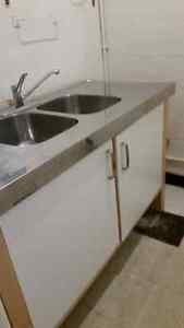 stainless steel double sink with cabinet and faucet