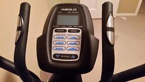 Elliptical with digital display and heart rate monitor