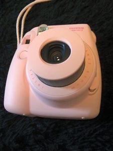 Pink polaroid camera