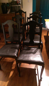 Six black antique wood dinning room chairs
