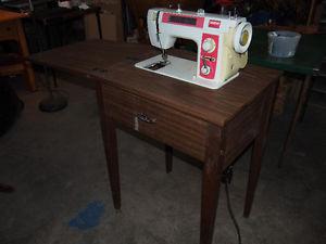 2 Sewing Machines & A Cabinet