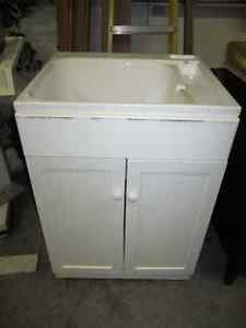 Laundry tub and cabinet