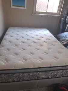 Queen size mattress and box spring.