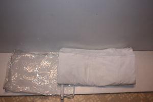 gently used “fitted mattress protector” (crib size)
