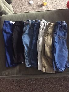 7 pairs of boys 12 month pants.