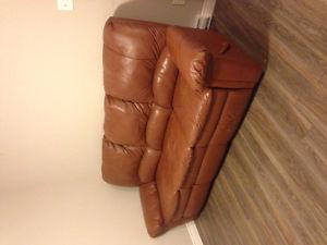 Reclining faux leather sofa