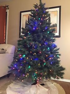 6 1/2 foot Christmas Tree with lights included