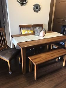 Dining table with 4 chairs and bench.