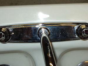Kohler cast iron sink with new Moen tap.