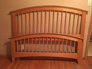 Queen bed headboard with wood frame.