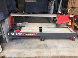 TILE AND STONE CUTTER/ELECTRIC SAW LIKE NEW