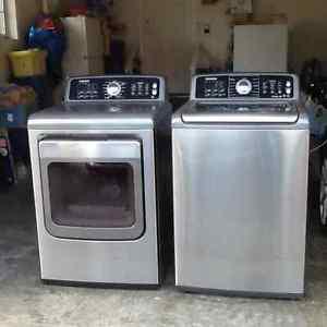 Top loading Samsung washer and dryer.