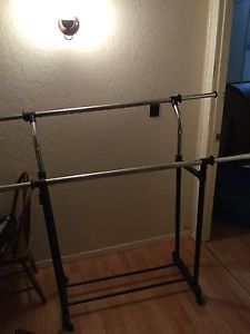 Two tier adjustable garment rack