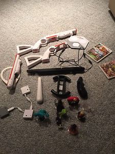 Wii console + huge number of games + rockband