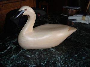 Wood carving of a swan