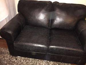 100% lather love seat for sale