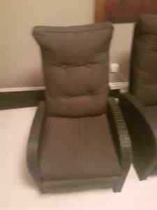 2x black wicker reclining chairs
