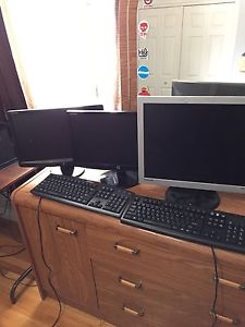 3 monitors 19"..... 2 keyboards $50 obo