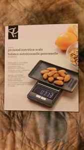 Brand new nutrition scale. Weighs up to 1/10th gram (0.00)