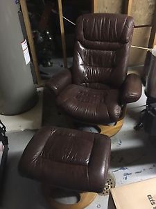 Brown leather reclining chair and ottoman