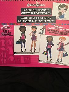 Girls drawing activity book with stencils
