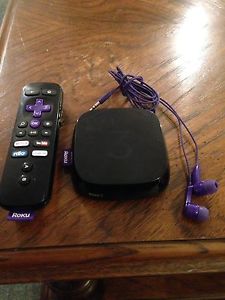 Roku 3 with remote and head phones.