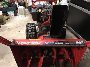 Troy-bilt 9 hp with 28 inch cut power steering and hand