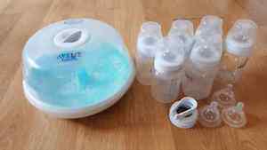 Avent 6 bottles and microwave steam sterilizer.
