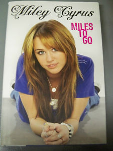 BOOK-MILEY CYRUS-NEW CONDITION