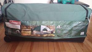 Coleman 6 Person Sundome Tent with chairs and sleeping bags