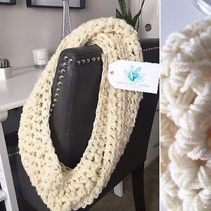 Crocheted infinity scarf in cream