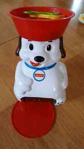 Fisher price. Lil Snoopy scoots and tips.