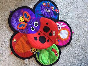 Lamaze tummy time mat with spinner.