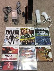 Nintendo Wii With Controller/Nunchuck and 6 Games!!