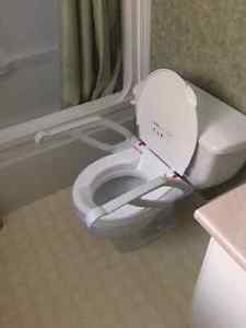 Toilet Seat 2 " Raise with Foldaway handrails