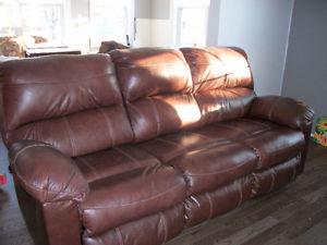 Ashley's Leather couch with reclining ends