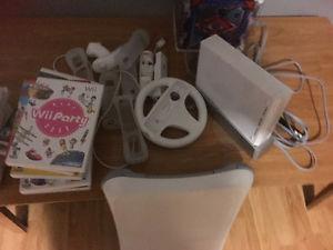 Complete wii system with fit board & 20 games