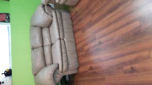 Faux leather taupe couch and love seat