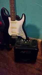 Jay Turser electric guitar and small amp