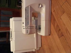 Kenmore sewing machine with hard case