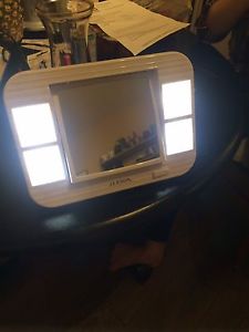 Lighted makeup mirror