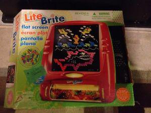 Lite Brite with pegs and paper