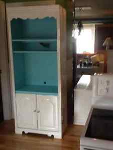 Cream and blue tall cabinet with light